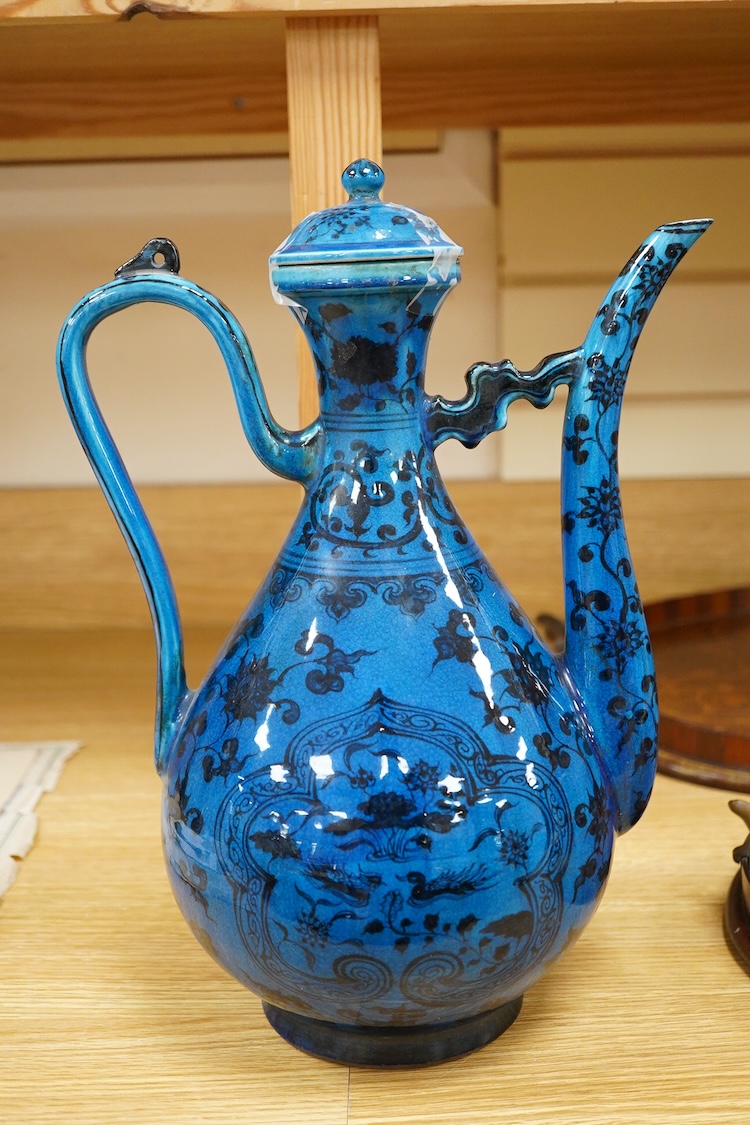 A Chinese blue glazed ewer and cover, 37cm high